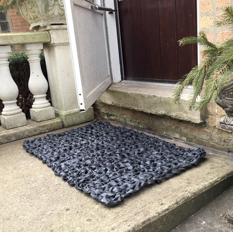 https://www.linksbyannette.com/cdn/shop/products/Rubber_welcome_mat_door_mat_crocheted_from_recycled_bicycled_inner_tubes_at_brown_door_1024x.JPG?v=1594190648